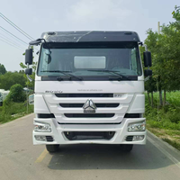 Camion-citerne Sinotruk Howo NX 8x4 12 roues pour distribution de carburant, citerne en acier au carbone, camion-citerne mobile pour distribution d'huile en carrière