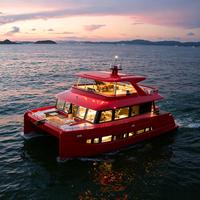 Catamaran de luxe de 62 pieds en fibre de verre soudée, avec deux moteurs in-bord de 440 CV et commande par écran tactile, idéal pour les croisières de plaisance en mer.