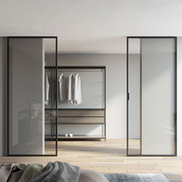 HDSAFE Porte coulissante en verre noir Fermeture en douceur Bureau Appartement Chambre à coucher Pas de voie inférieure Cadre en aluminium Intérieur Miroir Portes en verre