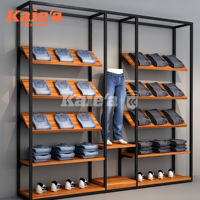 Magasin de vêtements moderne pour hommes Design d'intérieur Porte-vêtements argenté Porte-vêtements en métal Porte-vêtements amovible personnalisé pour magasin