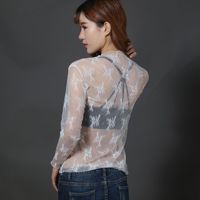 Blusa de encaje para mujer, camiseta de manga larga de malla, top corto de estilo extranjero, ropa sexy de malla hueca para primavera y otoño