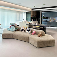 Canapé-lit modulable italien minimaliste pour villa, combinaison multi-personnes en arc, en tissu, nouveau modèle tendance pour appartement et hôtel