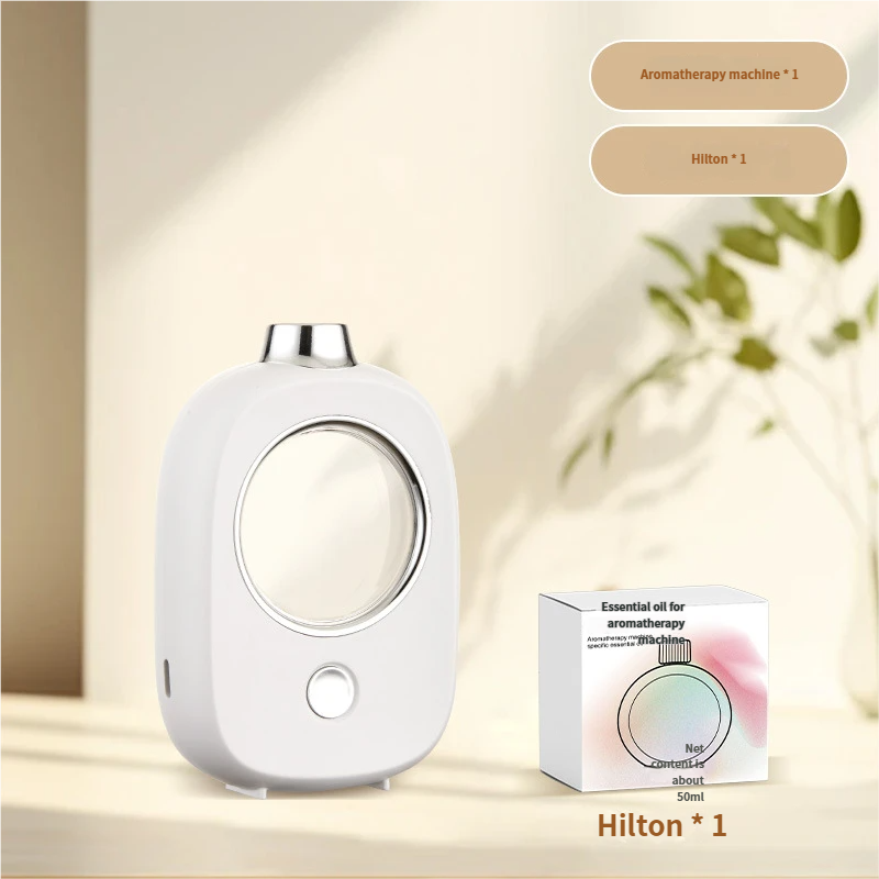 Diffuseur d'arômes argenté et Hilton