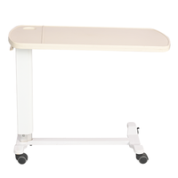 Mobilier de clinique Table de lit d'hôpital médical plateau roulant à roue pivotante réglable sur le chevet pour les aînés vente en gros d'usine