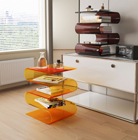 Table basse minimaliste moderne en acrylique à courbes S pour salon, console multi-étagères pour optimiser l'espace dans un loft