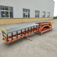 Chargeur mobile hydraulique pour la logistique avec système de convoyeur à rouleaux flexible