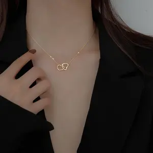 Alto pulido 18K oro titanio acero doble corazón colgante collar exquisito Acero inoxidable hueco corazón Collar para niñas