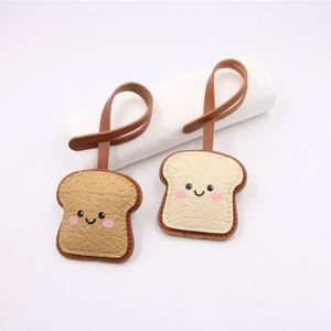 Hot Selling PU Leather Cute Bread <b>KeyChain</b> Cute Beautiful Mini Bag Charm Fashion Bag Pendant Festival Gift for Children - Product Image 1