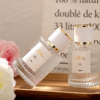 Flacon de parfum en verre de haute qualité de 50 ml, fond épais, cylindrique, vertical, avec bouchon à vis, pulvérisateur, sérigraphie