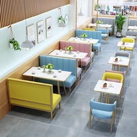 Meubles de restaurant d'art en fer de luxe léger usine de Foshan café commercial canapé contreplaqué ensemble table et chaises en marbre