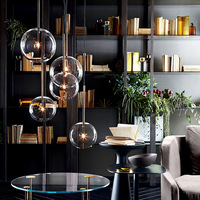 Lustre de salle à manger design artistique de luxe léger, luminaire sphérique en verre avec lumière LED chaude pour bar/chevet/boutiques