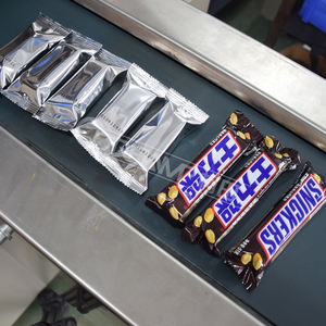 Coretamp VT-110 automatic multi function Hardware  horizontal pipe/<span class=keywords><strong>chocolate</strong></span>/pie/lemon slice packaging machine - Product Image 2