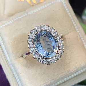 Elegante anello a forma di fiore con pietra ovale blu acqua per donna, design intarsiato, gioielli alla moda - Product Image 1