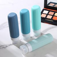 Kit de tube de voyage rechargeable en silicone bleu de 90ml en gros flacon de shampooing anti-fuite pour lotion après-shampooing