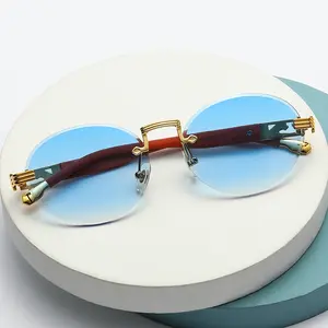 Lüks marka çerçevesiz elmas leopar kafa güneş gözlüğü yuvarlak çerçeve kesim kenar Metal güneş gözlüğü erkekler Retro UV400 koruma gözlük