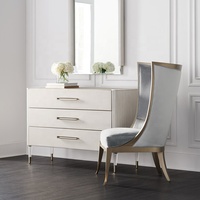 Fauteuil à bascule moderne de luxe à dossier haut, en velours capitonné, avec panneau en acier inoxydable, pour salon et maison
