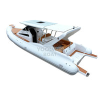 Bateau pneumatique semi-rigide (RIB) Yoolwin 960 Orca Hypalon à coque en V profond, robuste, pour la pêche sportive et les opérations de sauvetage, avec cabine en fibre de verre et deux moteurs hors-bord de 300 CV.