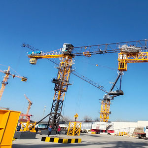 Grue à tour auto-érectile DAHAN 10 tonnes à plateau plat QTZ125(6015) avec moteur PLC, hauteur maximale 200 m, couple de levage nominal 125 t.m - Product Image 1