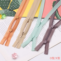 Vente en gros Fermeture à glissière invisible réversible multicolore Ruban à glissière invisible en nylon bidirectionnel pour vêtements d'allaitement