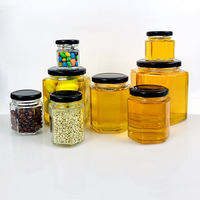 Botol kaca Jam heksagon kustom dengan tutup logam 45 60 85 100 180 280 380 500 ml untuk pengawet kesegaran acar