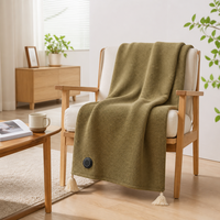 Couverture électrique personnalisée conçue pour vous envelopper dans la chaleur, avec une fermeture éclair intégrale et une doublure en polaire douce pour les soirées sur le canapé