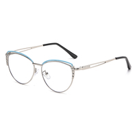 Lunettes de soleil photochromiques œil de chat en métal, unisexe, montures vintage, verres PC anti-lumière bleue, vente en gros à prix réduit