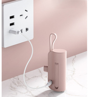Factory Ultra Mini 5000mAh USB Tipo-C Enchufe Estilo llavero Paquete de batería portátil Cable incorporado Cápsula Soporte Banco de energía