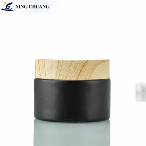 Sang Trọng Bán Buôn 5/10/15/20/30/50G Matte Màu Đen Mặt Kem <span class=keywords><strong>Jar</strong></span> Container <span class=keywords><strong>1</strong></span> <span class=keywords><strong>2</strong></span> 4 Oz Lọ Thủy Tinh Với Nhựa Hạt Gỗ Nắp - Product Image 6