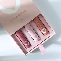 Emballage cosmétique de luxe personnalisé Boîtes en papier mat laminé rouge à lèvres baume à lèvres brillant à lèvres avec logo exclusif et doublure éponge