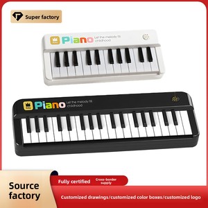 <span class=keywords><strong>Piano</strong></span> portable en plastique transfrontalier, clavier électronique multifonctionnel 37 touches avec lumières, pour débutants et enfants - Product Image 1