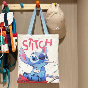 Borsa in tela all'ingrosso con cartone animato Stitch, borsa a tracolla semplice e carina, borsa tote di grande capacità, zaino scolastico in tela per studenti, peluche - Product Image 2