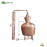 Alambic à gin miniature 50L avec panier à plantes aromatiques en acier inoxydable pour la fabrication artisanale de gin et de spiritueux aromatisés