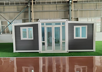 Maison conteneur préfabriquée en panneaux sandwich de 30 pieds, portable et modulaire, pour camp minier, bureau, logement de chantier et logement pour travailleurs