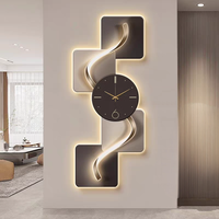 Horloge murale 3D haut de gamme en porcelaine sculptée avec éclairage LED, style mode, vente en gros, excellent rapport qualité-prix