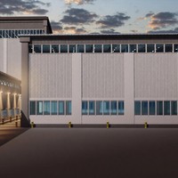 Bâtiment d'entrepôt préfabriqué en acier de style industriel moderne pour atelier et stockage, avec structure métallique rigide