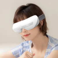 Masseur oculaire intelligent en graphène avec musique Bluetooth 4 modes de compression Airbag Batterie 1200mAh pour la relaxation au bureau et les soins des yeux