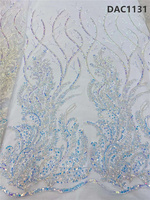 Nouveauté : Tissu en dentelle perlée avec paillettes et dentelle en filet pour robes de mariage/de soirée