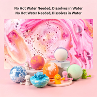 Bombes de bain aux huiles essentielles multicolores en boîte et boules de sels effervescents
