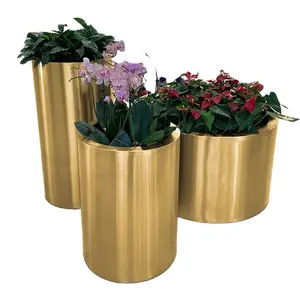 Vaso per piante in acciaio inossidabile dorato fioriera metallica a cilindro gigante per il centro commerciale