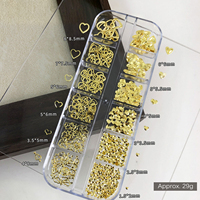 Lot de 12 grilles de breloques pour ongles en métaux mélangés or et argent, motifs cœur creux, fleur et papillon, pour la décoration d'ongles, emballage en boîte pour manucure