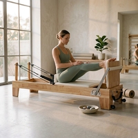 Prix d'usine, vente chaude : Reformer Pilates en bois de chêne avec résistance réglable et fonctionnement silencieux pour club de fitness