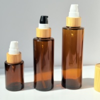 Bouteille en verre ambré personnalisée avec logo, couvercle en bambou, verre givré avec tête de pompe, couvercle en bambou pour cosmétiques, flacon pompe pour lotion