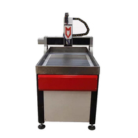 Guangzhou Multi Broche Numérique Auto Chargement Petit 9060-Cnc-Router Bois 4 Axes Bureau 9060 Cnc Routeur