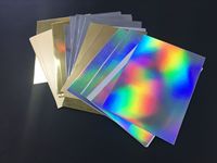 Vente en gros 300GSM Papier couché miroir métallique Papier cartonné argenté holographique au laser pour la fabrication de gâteaux