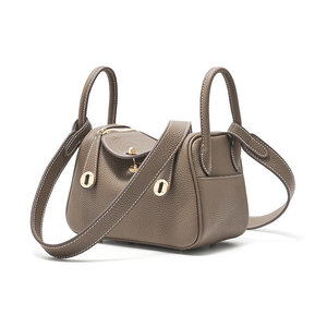 2026 New Fashion <b>Women's</b> <b>Bucket</b> <b>Bag</b> High Quality Cowhide Simple Style Genuine Leather Handbag with Button Closure - Product Image 1