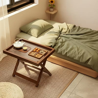 Table d'étude moderne en bois pliable avec plateau à collation et rebords surélevés, idéale pour chambre à coucher, fenêtre en baie, table basse autoportante