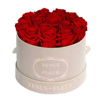 Boîte à fleurs roses avec logo personnalisé Boîte cadeau ronde en carton Emballage de boîte cadeau de fleurs avec poignée en ruban