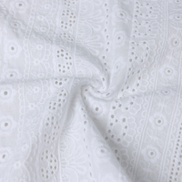 Tissu de broderie d'oeillet de fleur florale tissé de haute qualité de 100% coton pour le vêtement