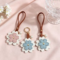 Breloque de sac en cuir motif floral, porte-clés, pendentif pour sac à main, accessoire floral, cadeau, breloque décorative pour sac fourre-tout