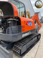 Excavatrice sur chenilles Doosan DH60 7 d'occasion, prête à être expédiée, unité compacte de 6 tonnes pour les travaux de terrassement en arrière-cour.